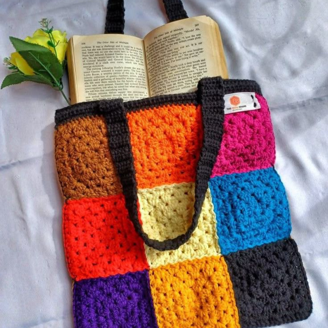 Untitled-design-2025-02-28T093512.115.png Handmade Crochet Goodie Bag - Image 1